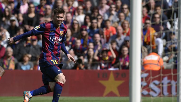 Barcelona forward Lionel Messi scores during his side's 6-1 win against Rayo Vallecano.