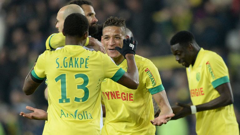 Nantes' players celebrate at the end of the French L1 football match between Nantes and Evian-Thonon-Gaillard