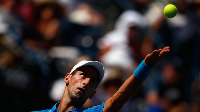 Novak Djokovic of Serbia in action against Andy Murray of Great Britain during day thirteen of the BNP Paribas Open tennis at the Indian Wells