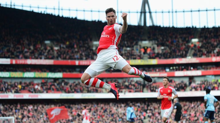 Olivier Giroud of Arsenal celebrates scoring the opening goal against West Ham