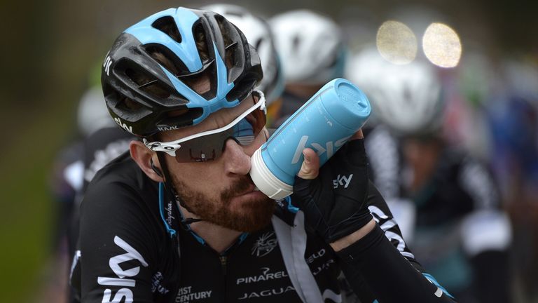 Great Britain's Bradley Wiggins drinks as he rides in the pack during the third stage of Paris-Nice 