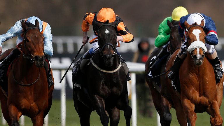 DONCASTER, ENGLAND - MARCH 28: Jimmy Fortune riding Tullius (R) win The Betway Doncaster Mile at Doncaster racecourse on March 28, 2015 in Doncaster, Engla