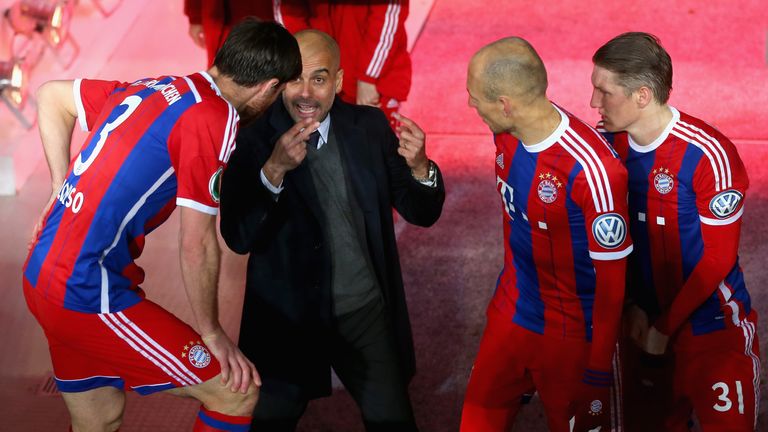 Pep Guardiola of Bayern Munich with Xabi Alonso, Arjen Robben and Bastian Schweinsteiger prior to the match against Eintracht Braunschweig in March 2015