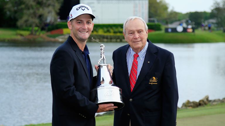 Matt Every receives the trophy from tournament host Arnold Palmer for the second year running