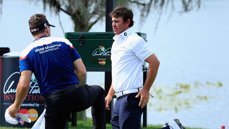 Brooks Koepka is treated for a rib injury during the final round of the Arnold Palmer Invitational at Bay Hill