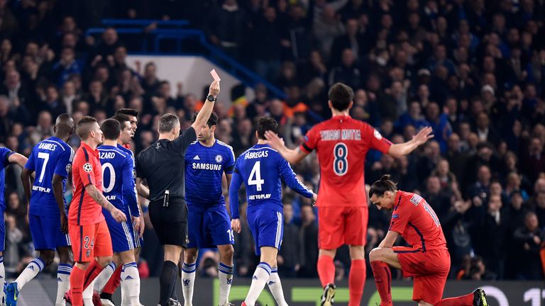 Paris St Germain's Zlatan Ibrahimovic is shown a red card by referee Bjorn Kuipers