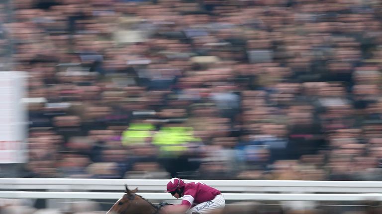 Don Poli ridden by Bryan Cooper races clear to win the RSA Chase on Ladies Day during the Cheltenham Festival at Cheltenham Racecourse.
