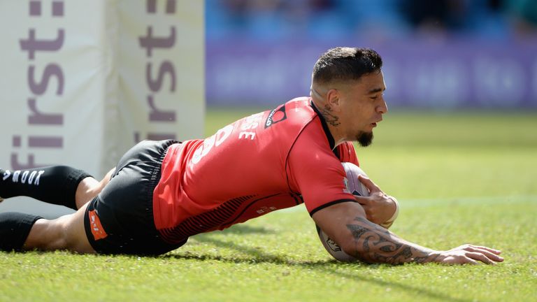MANCHESTER, ENGLAND - MAY 17:  Rangi Chase of Salford Red Devils scores his first half try during the Super League match between Widnes Vikings and Salford