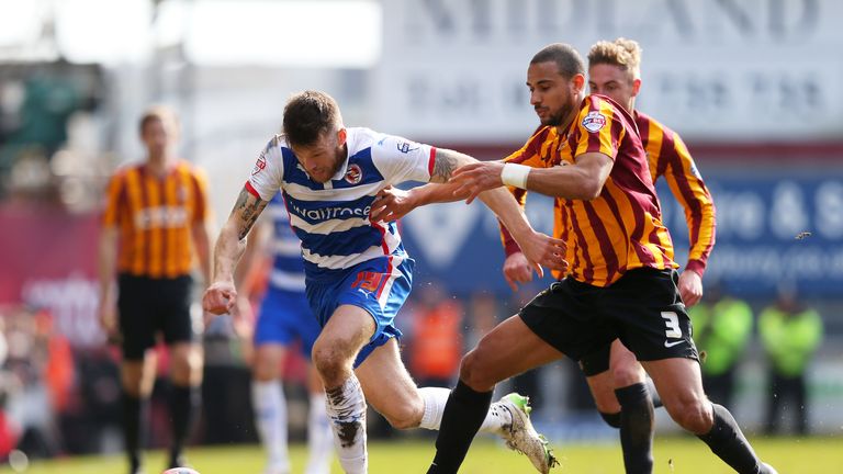 Jamie Mackie of Reading goes past the challenge from James Meredith of Bradford City during the FA Cup Quarter Final match b