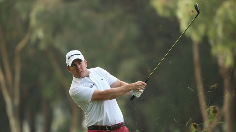 Richie Ramsay of Scotland plays his second shot on the 18th hole during the third round of the Trophee Hassan II Golf.