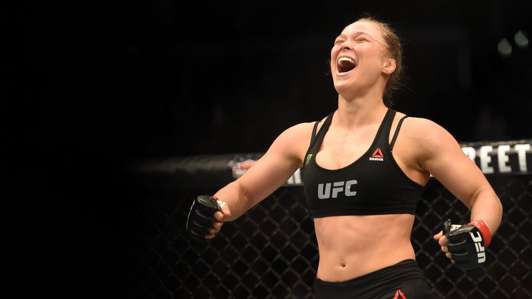 LOS ANGELES, CA - FEBRUARY 28:  Ronda Rousey celebrates her victory over Cat Zingano in their UFC women's bantamweight championship bout during the UFC 184