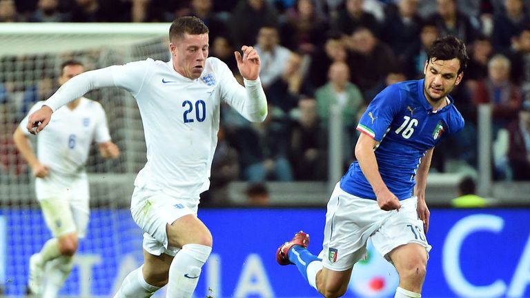 England's midfielder Ross Barkley vies with Italy's midfielder Marco Parolo