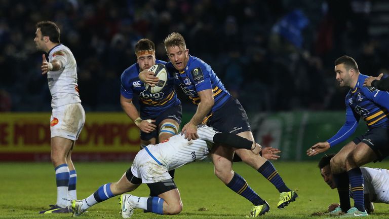 Castres Thomas Combezou tackles Leinster's Luke Fitzgerald