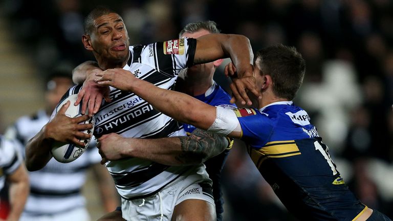 Hull FC's Leon Pryce is tackled by Leeds Rhino's Jamie Peacock and Stevie Ward during the First Utility Super League match at The KC Stadium, Hull.