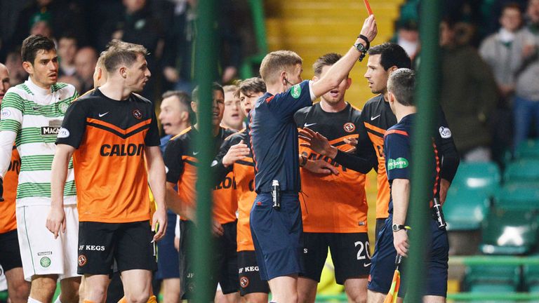 Dundee United defender Ryan McGowan is dismissed against Celtic