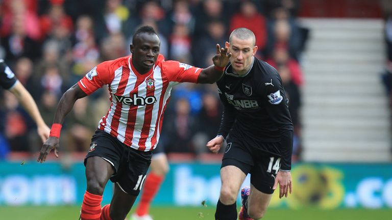 Southampton's Sadio Mane (left) and Burnley's David Jones vie for possession