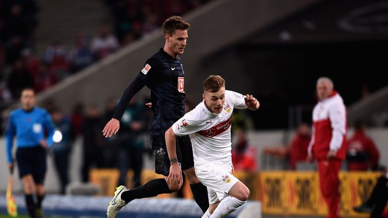STUTTGART, GERMANY - MARCH 06:  Sebastian Langkamp of Hertha BSC chases Alexandru Maxim of VfB Stuttgart 