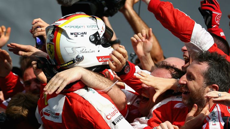 Sebastian Vettel receives the acclaim of his new Ferrari colleagues 