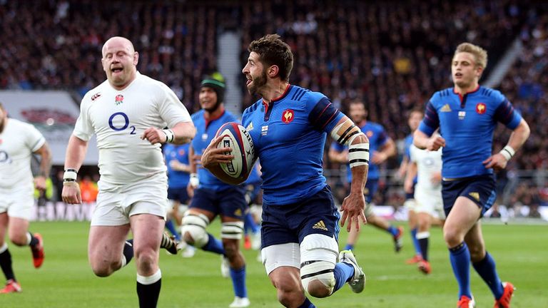 France's Sebastien Tillous-Borde breaks away to score their first try during the 2015 RBS Six Nations match at Twickenham Stadium, London.