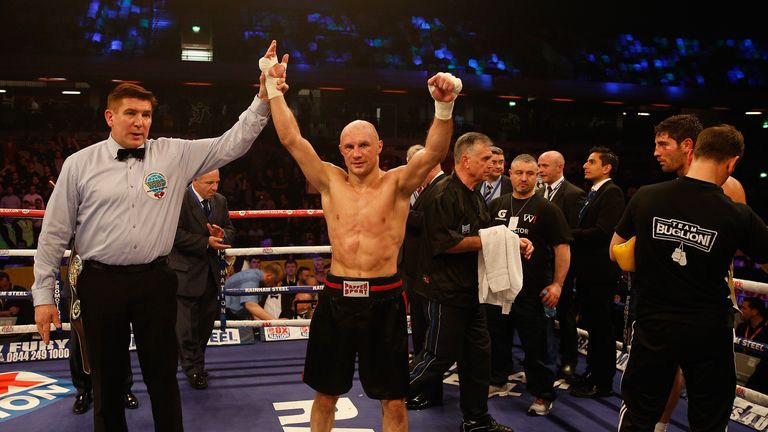 LONDON, ENGLAND - APRIL 12:  Sergey Khomitsky (C) celebrates defeating Frank Buglioni (R) during their WBO European Super-Middleweight Championship bout at