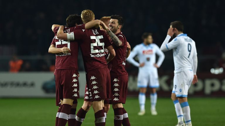 TURIN, ITALY - MARCH 01:  Kamil Glik (C) of Torino FC celebrates victory with team mates at the end of the Serie A match between Torino FC and SSC Napoli a