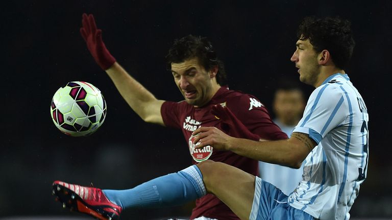 TURIN, ITALY - MARCH 16:  Silva Gaston (L) of Torino FC is challenged by Danilo Cataldi of SS Lazio during the Serie A match between Torino FC and SS Lazio