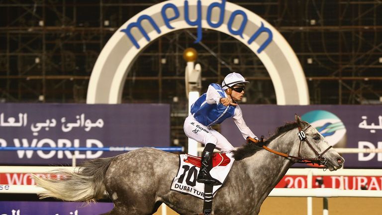DUBAI, UNITED ARAB EMIRATES - MARCH 28:  Solow   ridden by Maxime Guyon wins the Dubai Turf during the Dubai World Cup at the Meydan Racecourse on March 28