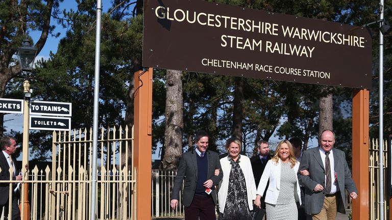 Racegoers arrive at Cheltenham Racecourse