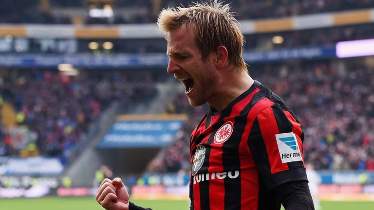 FRANKFURT AM MAIN, GERMANY - MARCH 14:  Stefan Aigner of Eintracht Frankfurt celebrates as he scores the 
