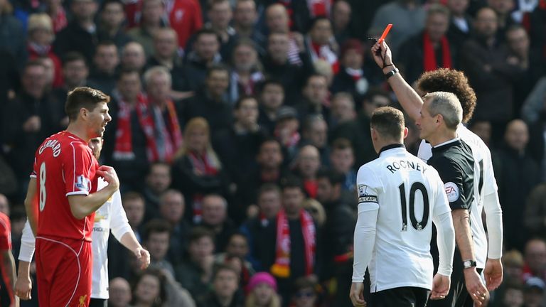 Steven Gerrard of Liverpool is sent off by referee Martin Atkinson during the Barclays Premier League match at Anfield