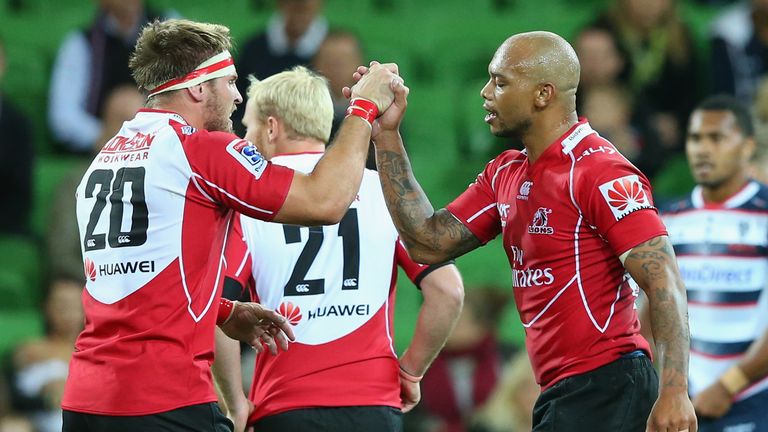 Jaco Kriel and Lionel Mapoe Lions celebrate win over the Rebels