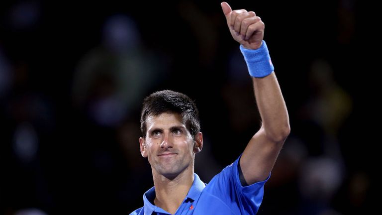 Novak Djokovic acknowledges the crowd after his win over Martin Klizan during day 6 of the Miami Open 