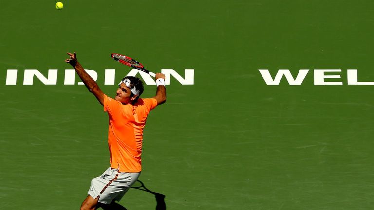 Roger Federer serves to Tomas Berdych during the BNP Paribas Open at Indian Wells