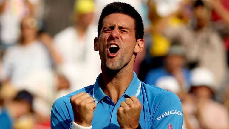 Novak Djokovic celebrates his win over Roger Federer at the BNP Paribas Open in Indian Wells