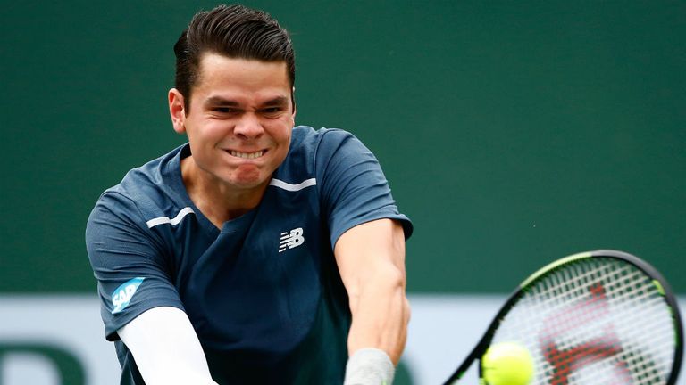 Milos Raonic in action against Tommy Robredo during the BNP Paribas Open at Indian Wells 