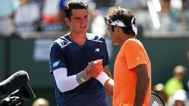 Roger Federer  is congratulated by Milos Raonic at Indian Wells
