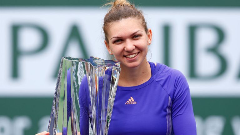 Simona Halep with the winners trophy after defeating Jelena Jankovic in the final of the BNP Paribas Open in Indian Wells 