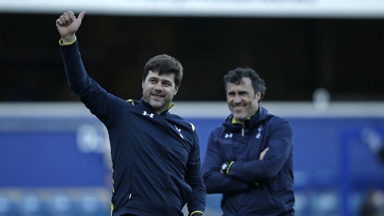 Mauricio Pochettino signals to the away supporters after Totenham's win at QPR