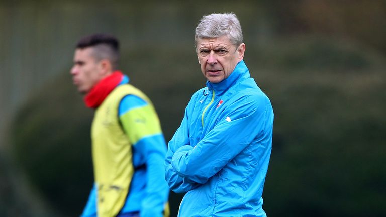 ST ALBANS, ENGLAND - MARCH 16: Arsenal manager Arsene Wenger keeps an eye over the training session during the Arsenal Training Session ahead of their Cham