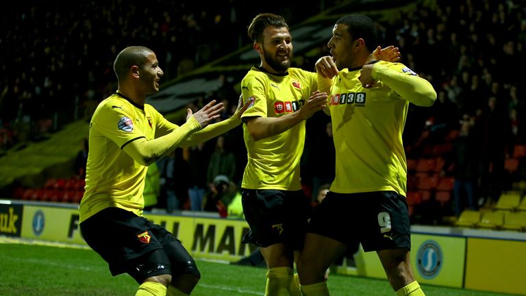 Troy Deeney of Watford celebrates scoring the first goal against Fulham