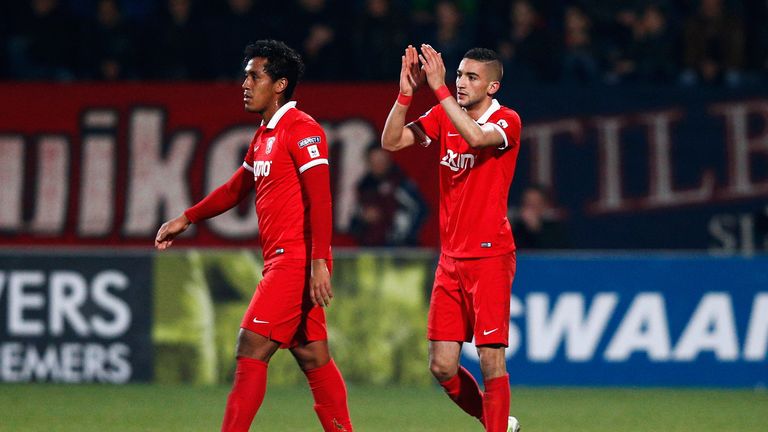 Hakim Ziyech of Twente celebrates after he scores his teams first goal of the game with team mate, Renato Tapia .
