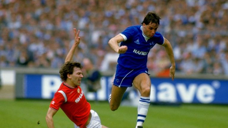 18 May 1985:  Pat Van den Hauwe of Everton goes past Bryan Robson of Manchester United during the FA Cup Final at Wembley Stadium in London. Manchester Uni