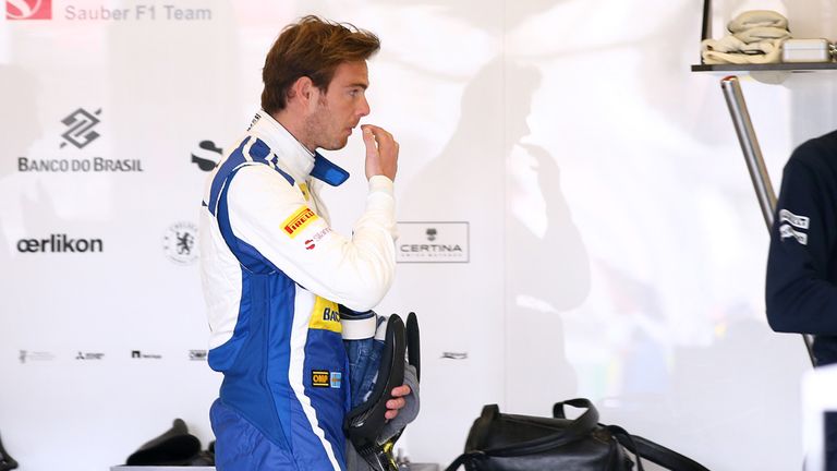  Giedo van der Garde of Netherlands and Sauber F1 walks through the team garage