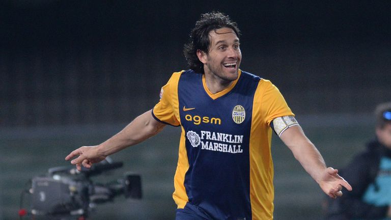  Luca Toni of Hellas Verona celebrates after scoring his team's second goal during the Serie A match between Hellas Verona FC and Napoli