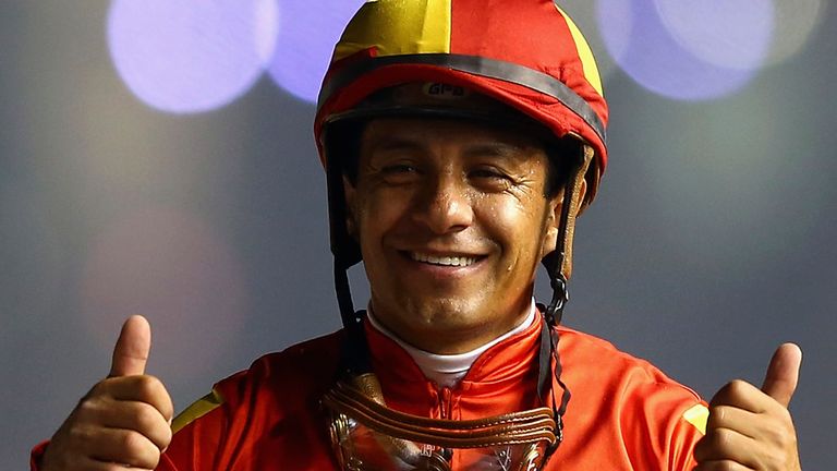 DUBAI, UNITED ARAB EMIRATES - MARCH 28: Victor Espinosa celebrates after winning the Dubai Golden Shaheen during the Dubai World Cup at the Meydan Racecour