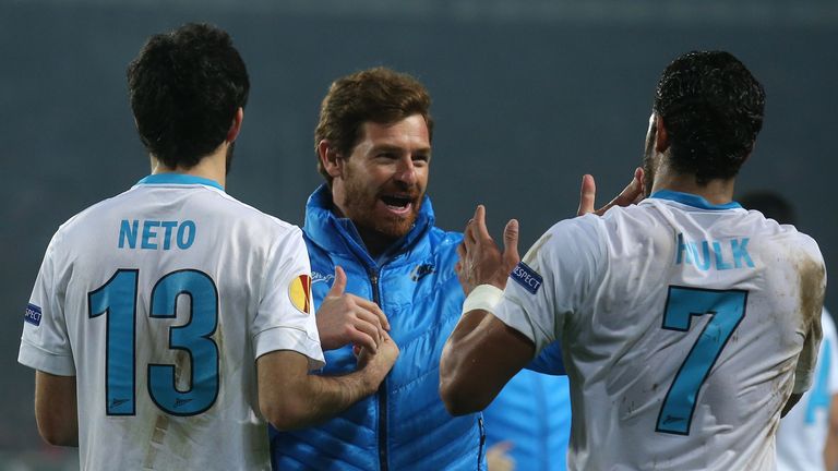 Zenit's coach Andre Villas-Boas celebrates with his players