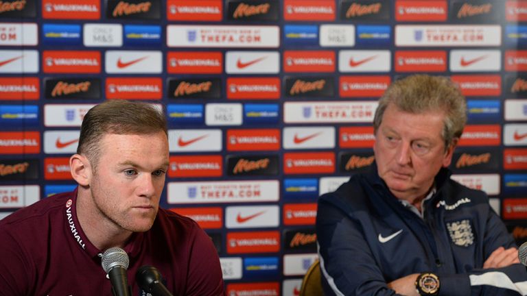 England manager Roy Hodgson (R) and striker Wayne Rooney (L) give a press conference at the Grove Hotel, 
