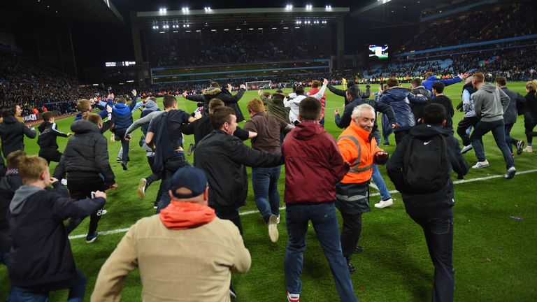 Aston Villa fans run on to the pitch at full-time in their side's FA Cup win over West Brom