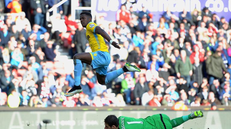 Wilfried Zaha of Crystal Palace beats Stoke goalkeeper Asmir Begovic to edge the Eagles into a 2-1 lead