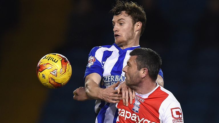 SHEFFIELD, ENGLAND - JANUARY 27: Will Keane of Sheffield Wednesday in action with Paul Robinson of Birmingham during the Sky Bet Championship match between